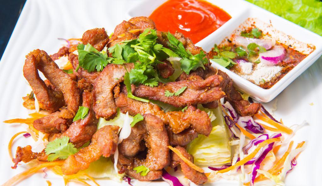 A08. Beef Jerky · deep fried beef strips marinated with homemade sauce and sweet & chili sauce with sriracha.