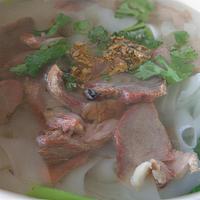 B11. BBQ Pork Noodle Soup · BBQ pork, Chinese sausage and yao choy in clear broth.