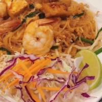 C01. Pad Thai Noodle · Stir-fried thin rice noodle, shrimps, dry shrimps, egg, ground peanut, tofu and bean sprout ...