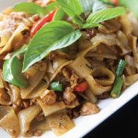 C03. Pad Kee Mao Noodle · Stir-fried flat rice noodle and your choice of ground meat with green bean, bell pepper, Tha...