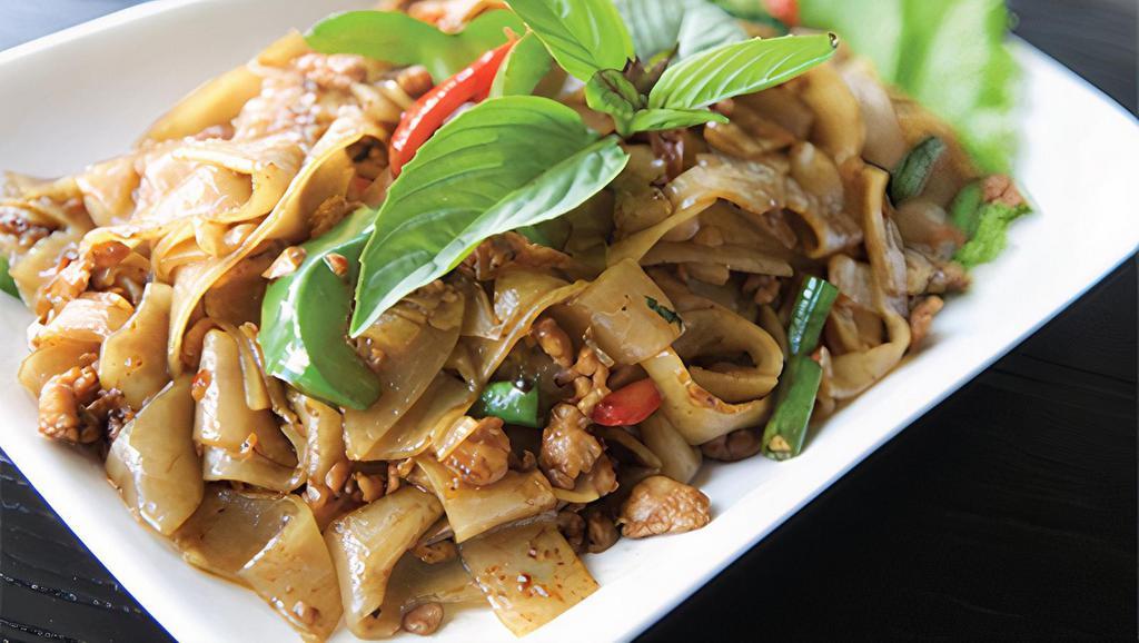 C03. Pad Kee Mao Noodle · Stir-fried flat rice noodle and your choice of ground meat with green bean, bell pepper, Thai chili, and basil.
