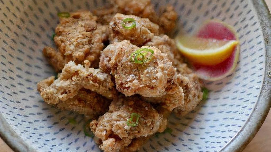 Fried Chicken Karaage · Marinated fried chicken and Japanese tartar sauce.