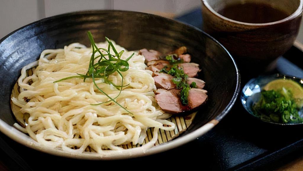 Duck Tsuke Udon · Seared duck breast, chives, with a rich duck and dashi dipping broth.