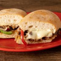 Philly Cheese Steak · thinly sliced beef steak, provolone cheese,  grilled onions, peppers and mayo on a ciabatta ...