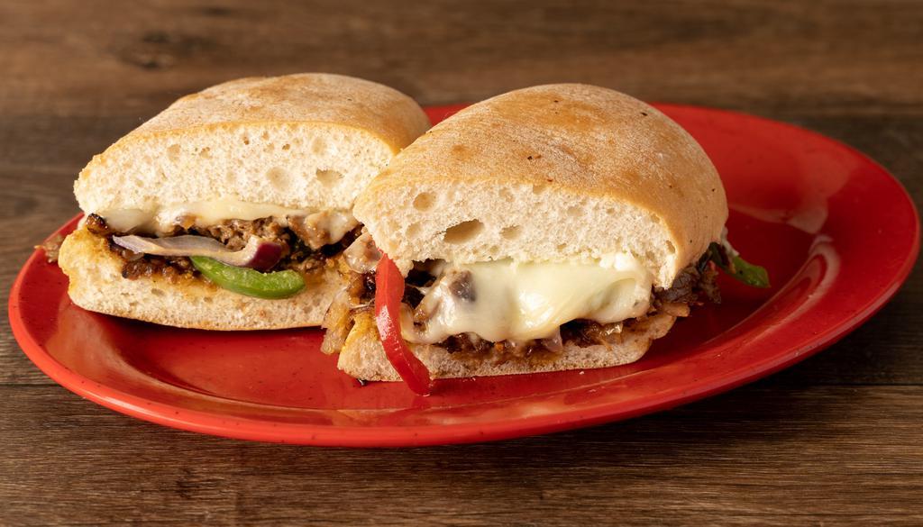 Philly Cheese Steak · thinly sliced beef steak, provolone cheese,  grilled onions, peppers and mayo on a ciabatta roll