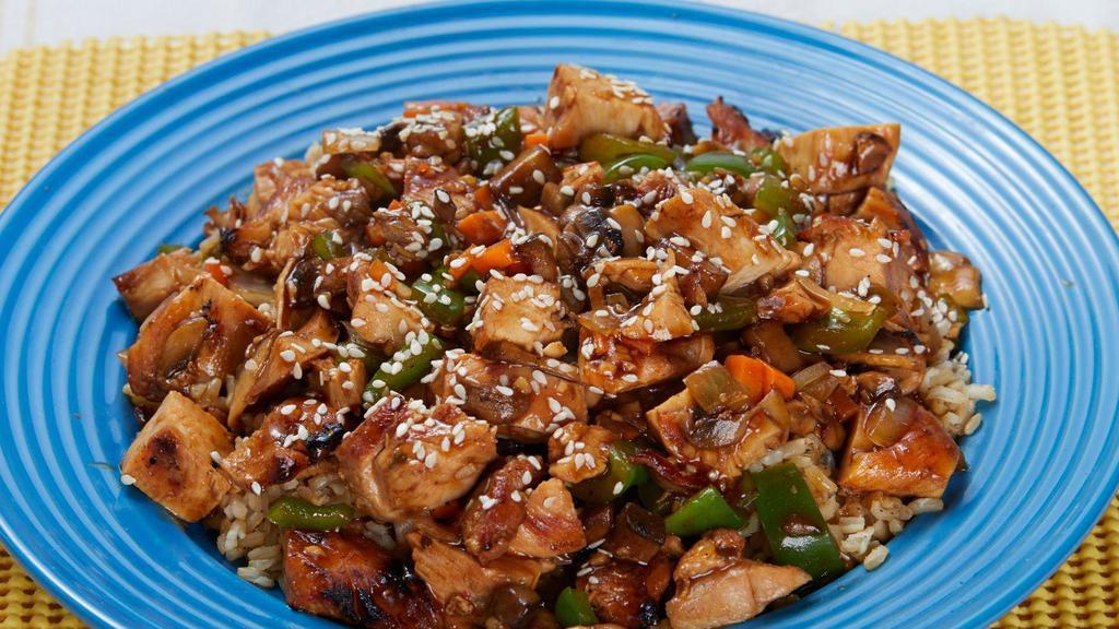 Teriyaki Stir Fry · Chicken or steak, potobella mushrooms blend, sauteed green peppers and onions, carrots, sesame seeds, and teriyaki sauce over brown rice.