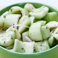 Cucumber Salad · Cucumbers, dill  in  a vinegar base.