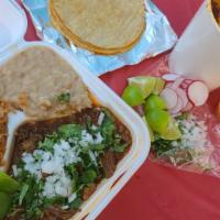 Birria Plate · Plate served with rice and beans.