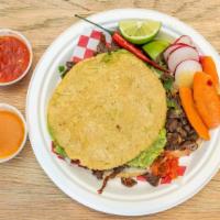 Mulitas · Mulitas are basically a double-deck quesadilla with two corn tortillas and meat on the insid...