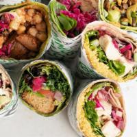 The Original Mediterranean Wrap · All the classic Mediterranean flavors inside your choice of a spinach or wheat wrap, filled ...