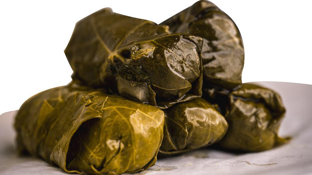  Dolmades · Our vine leaves stuffed with basmati rice, herbs and spices.