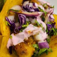 Fish Tacos · Onions Cilantro, salsa , salsa guacamole, lettuce, tomatoes, cabbage , lime onions ,Baja Cal...