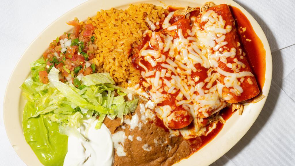 3 Enchilada Plate · 3 Enchiladas with up to 3 individual stuffing options and choice of red or green sauce served with rice, refried beans topped with cheese, pico de gallo salsa, sour cream, guacamole and lettuce.