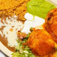 Chile Relleno Plate · Two Home made Chili Rellenos served with rice, refried beans topped with cheese, pico de gal...