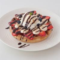Ice Cream Waffle · Ice Cream, Seasonal Fruits, Whipped Cream, Chocolate Syrup