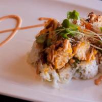 K2. Fall in Love Roll · Spicy scallop & avocado, topped w/ snow crab salad, dry tuna & tobiko, baked w/ spicy & unag...