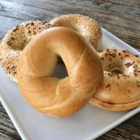 Bagel with cream cheese · choice of Plain, wheat, Asiago, everything seed, onion.