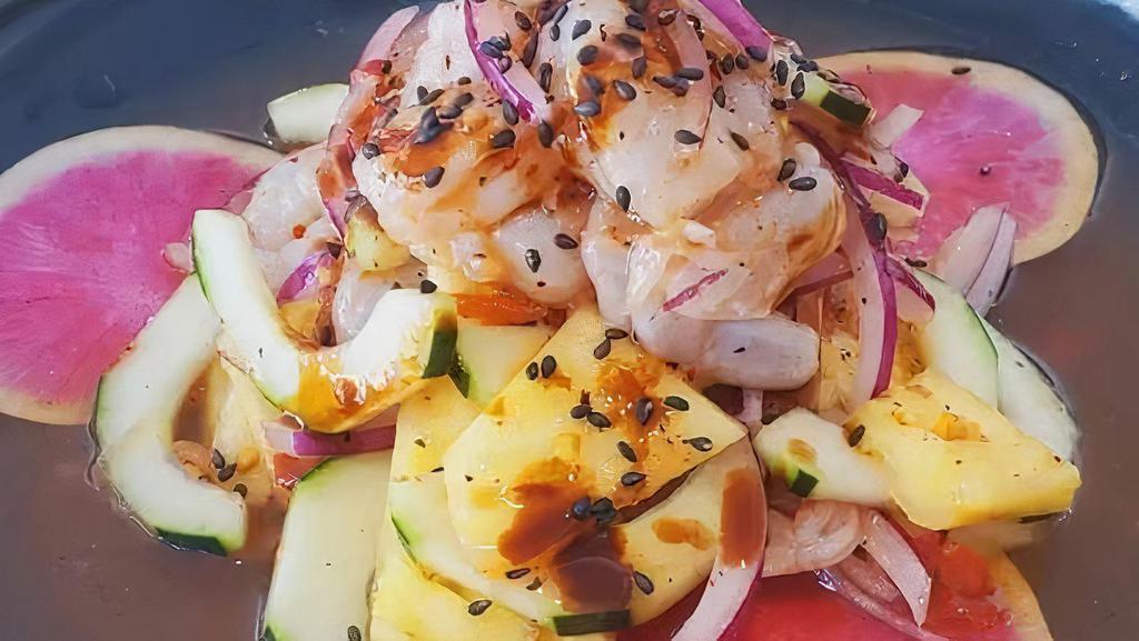 Aguachile Rojo · Shrimp, cucumber, red onion marinated in red spicy sauce and lime juice