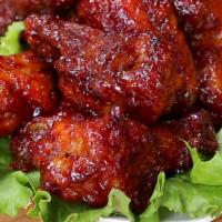 BBQ Chicken Wings · Sweet tangy barbeque sauced topped on oven-baked chicken wings.