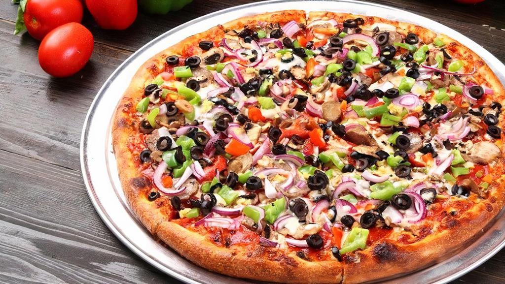 Combination Pizza (Combo) · Red sauce, fresh mushrooms, Roma tomatoes, sweet red onions, green bell peppers, black olives, pepperoni, smoked ham, Italian salami, Italian garlic sausage.