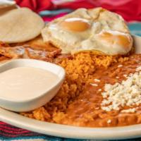 Chilaquiles · Served with rice, beans, and two eggs. Fresh chips covered in cheese and mild red or mild gr...