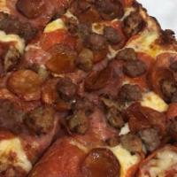 Chuck Wagon - Slice · Salami, Pepperoni, Mushrooms, Black Olives Green Bell Peppers, Onions, Linguiça, Sausage, Be...