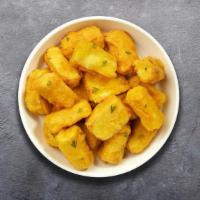 Paneer Pakora · Cottage cheese dipped in a light batter and fried until golden brown.