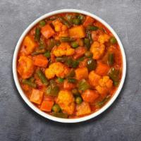 Vegetable Curry (Vegan) · Fresh cubes of cottage cheese marinated in yoghurt and baked in a tandoor clay oven.