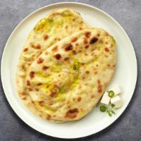 Cheesy Mood Naan · Freshly baked bread stuffed with cottage cheese cooked in a clay oven.