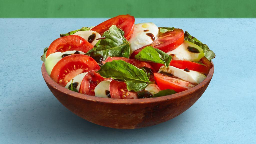 Caprese Salad · Fresh mozzarella, tomatoes, and basil, tossed with balsamic viniagrette.