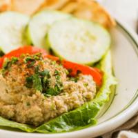 Hummus Dip or Feta Spread and Pita · Served with warm pita and sliced cucumbers.