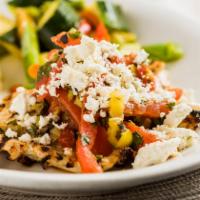 Charbroiled Chicken Reganati · Marinated in herbs, garlic, olive oil, topped with our mediterranean salsa and feta cheese. ...