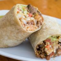 The Surf & Turf Burrito · Shrimp and carne assada, rice, beans, pico de gallo, cheese, guacamole, and your choice of s...