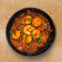 Classic Shrimp Curry · Shrimp is prepared in tomato sauce and cream with Indian spices.