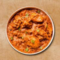 Classic Chicken Tikka Triumph · Cubes of tender chicken are prepared in tomato sauce and cream with Indian spices.