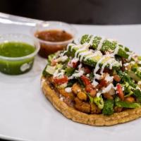 Sope · Your Choice of Protein and Beans with Cheese, Fresh Salsa, Guacamole, and Sour Cream wrapped...