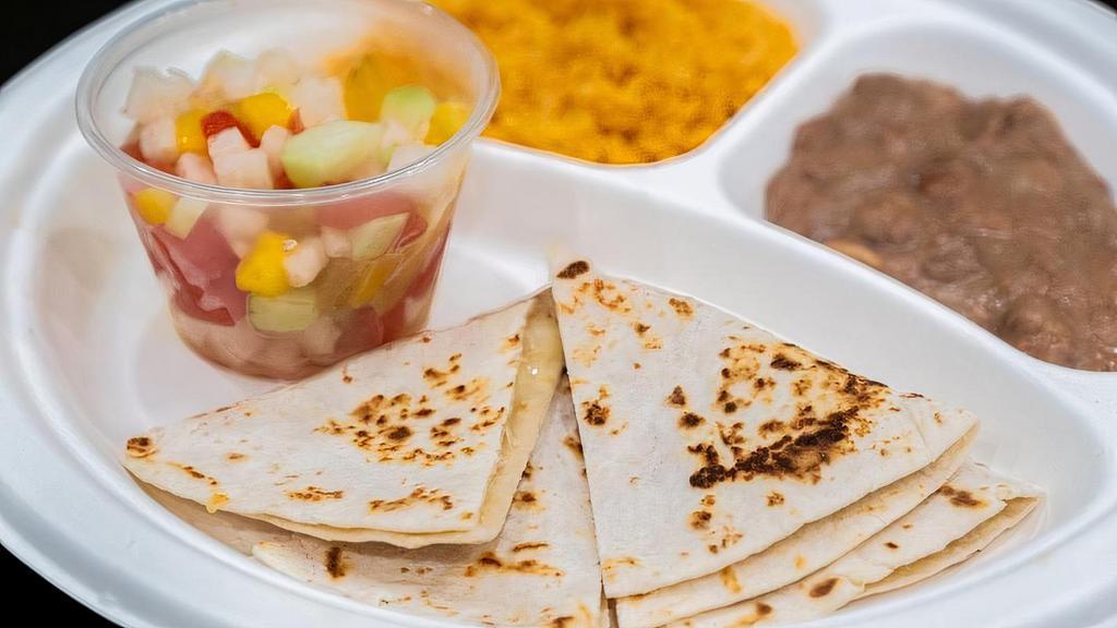Kids Meat Quesadilla · A flour tortilla grilled with Monterey cheese choice of protein, rice, and beans on the side.