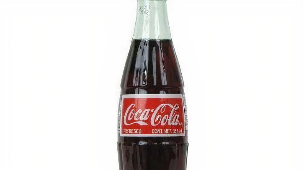 Mexican Bottled Glass Coca-Cola · Mexican Coke uses natural cane sugar, and even if it has the same number of calories and really isn't healthier than high fructose corn syrup — it just tastes better!