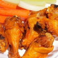 Wings · BBQ, buffalo, or fire sauce. Served with carrots, celery and ranch dressing. (8 WINGS)
