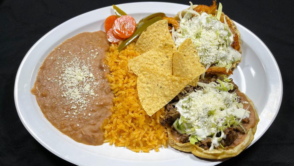 Sope Plate · 2 handmade corn sopes with any kind of meat from menu, along with rice and refried beans