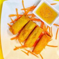 Crispy Chicken Rolls · Served with sweet and sour sauce.