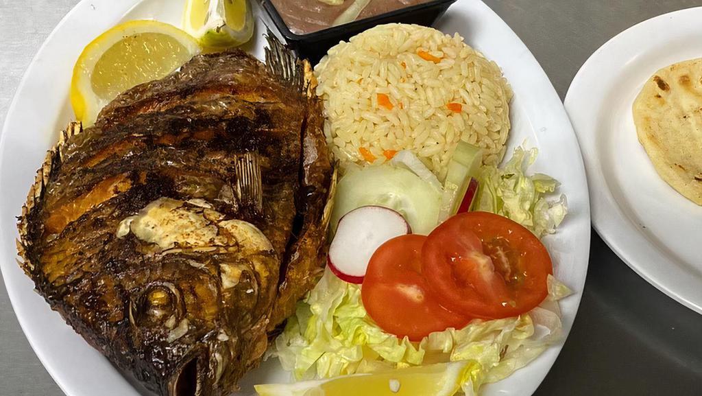 Mojarra Frita/ Whole Fried Fish  · Whole fried fish, served with rice, beans and handmade tortillas.