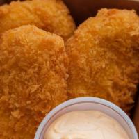 Shrimp Croquette · 2 Shrimp Croquettes fried to a golden brown and served with spicy mayo sauce.