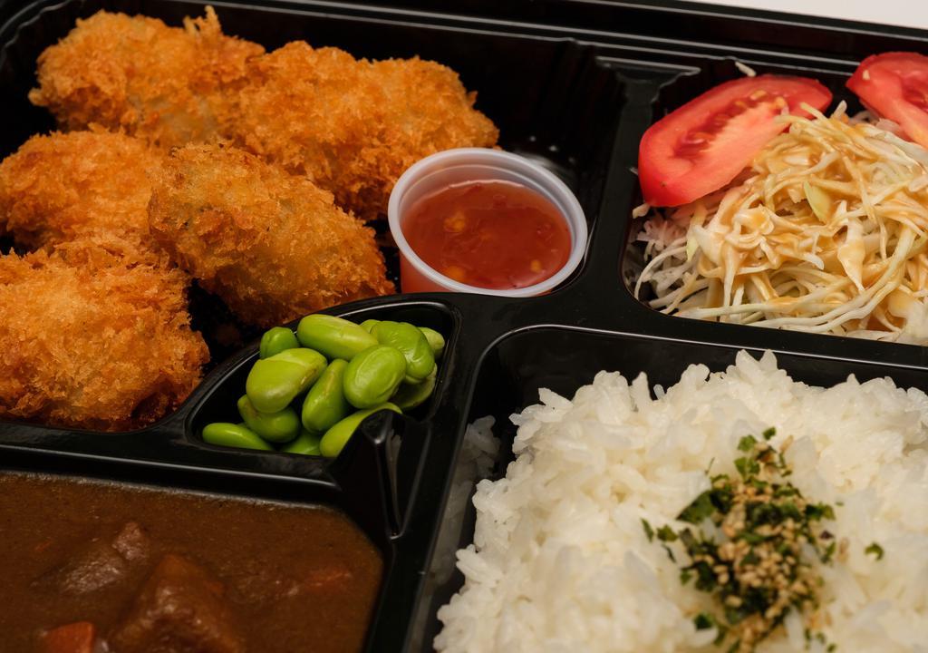 Kaki Fry Curry Bento · Deep-fried oyster (From Hokkaido, Japan). Served with housemade curry, edamame, and Japanese-style salad.