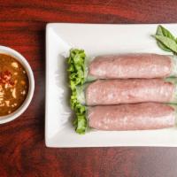 A3. Char-Broiled Pork Rolls (3)/Nem Cuốn · Charbroiled pork roll, lettuce, mint wrapped in rice paper served with house special sauce.