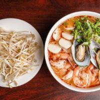 P10. Spicy & Sour Seafood Rice Noodle Soup/Phở đồ Biển Chua Cay · Spicy. Shrimp, squid, mussels, fish ball.