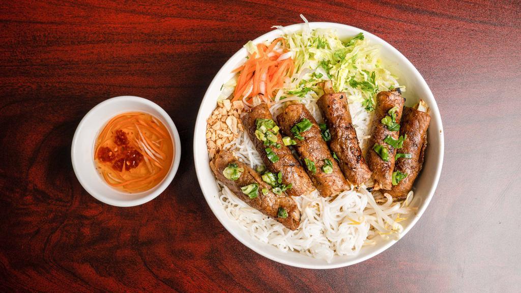 C3. Char-Broiled Beef Rolled with Onion/ Cơm Bò Nướng Hành Hương · Served with fresh salad, tomatoes, cucumbers, and house vinaigrettes, and steamed rice.