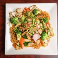 H5. Stir-Fried Combination Chow Mein - Mì Xào Thập Cẩm · Yellow noodles stir-fried with chicken, pork, mixed vegetables.