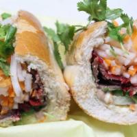 BBQ Pork - Banh Mi Xa Xiu · In house made Chinese style BBQ Pork on a fresh French Baguette! Comes with Vietnamese mayo,...