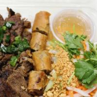 (61) Grilled Pork Vermicelli (Bun Thit Nuong Cha Gio) · 61. juicy Grilled pork on a bed of Vermicelli noodle, eggroll, pickled veggies, and a side o...